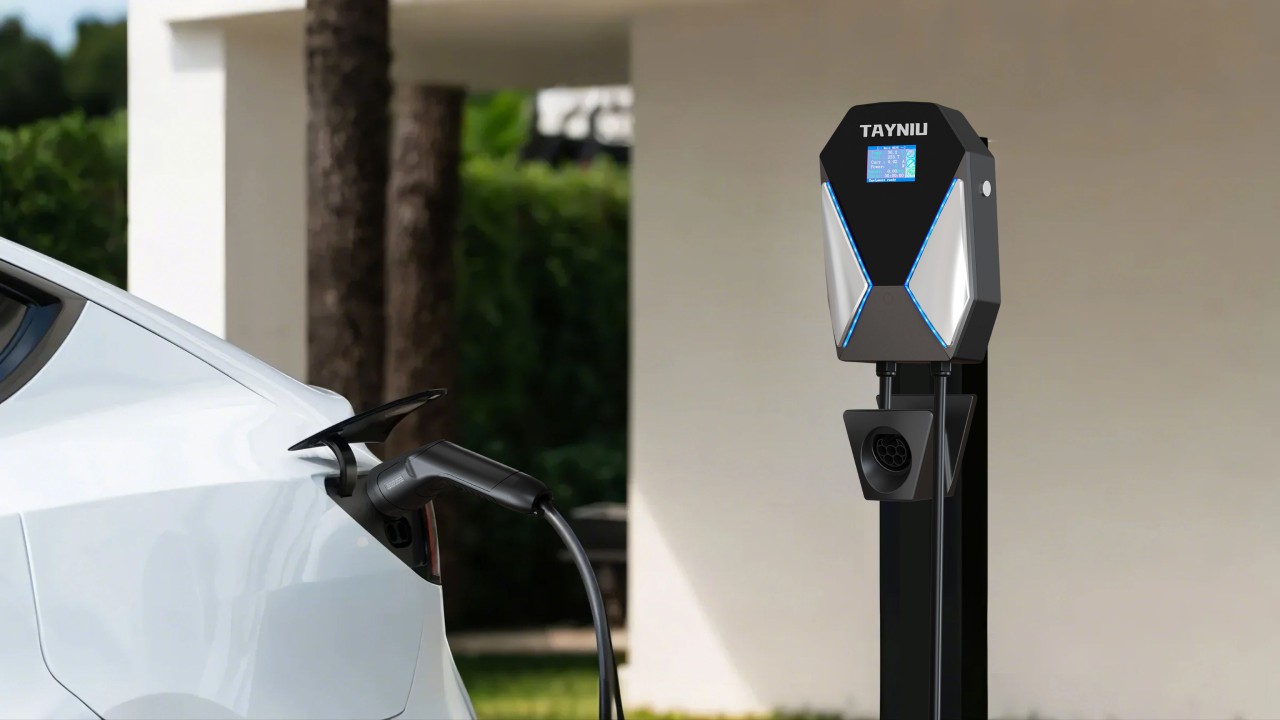 A Tayniu home EV charger in use, showcasing its modern design and compatibility with electric vehicles like Tesla.