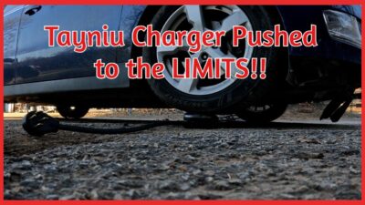 Tayniu SmoothPro EV charger undergoing an extreme durability test by Greencastle Garage, proving its rugged and impact-resistant design.